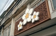 Plumeria facade wood carving